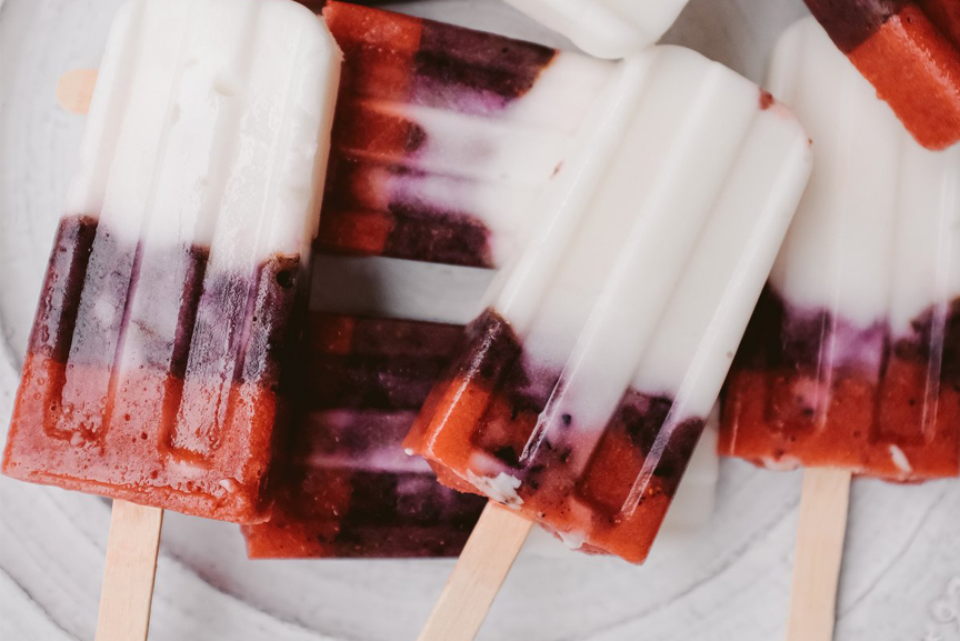 Superfood popsicles on a plate.