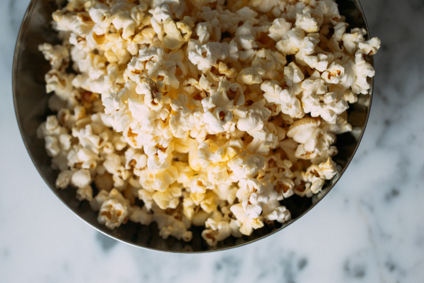 Bowl of nutritional yeast dusted popcorn